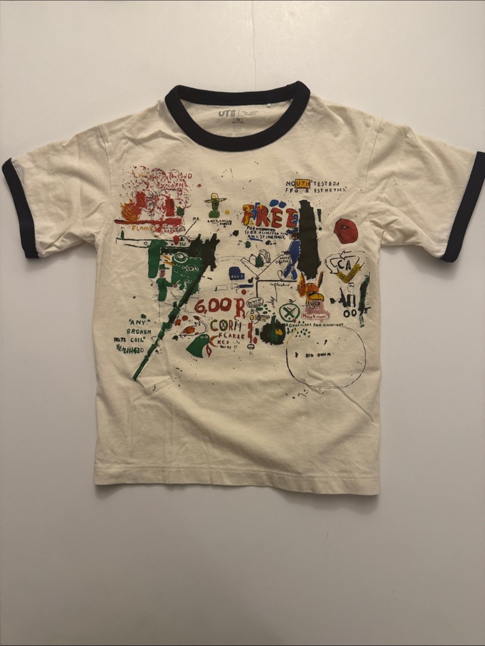 Jean-Michel Basquiat Cream Ringer Tee with Black Trim and Colorful Graphic